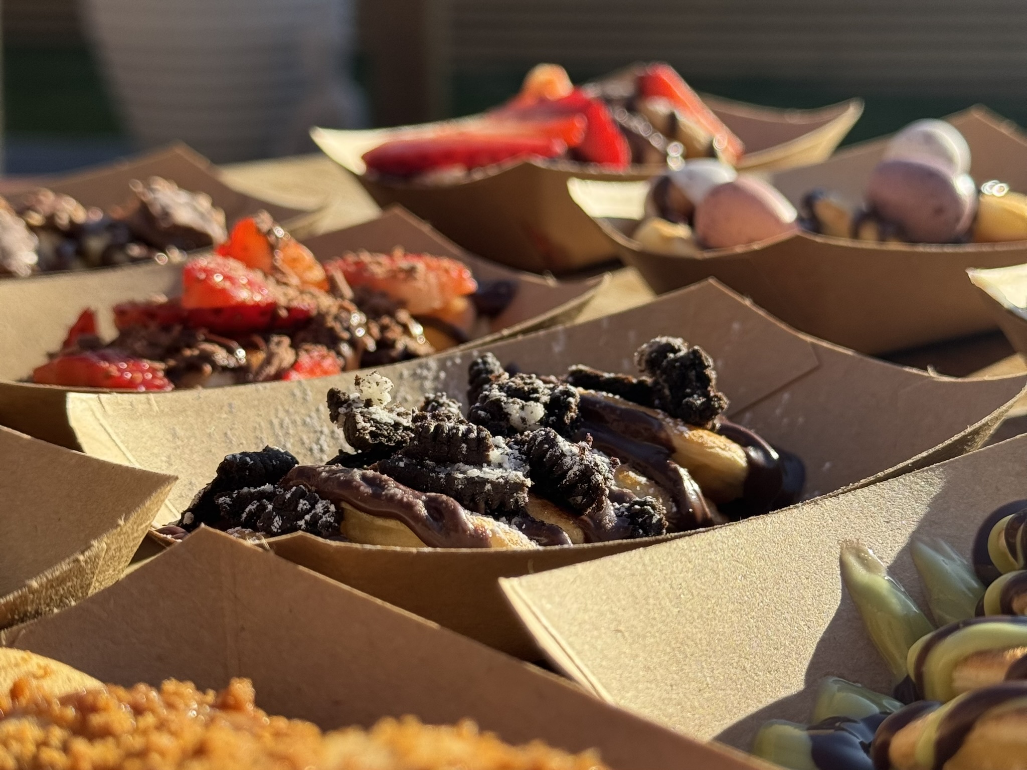 Freshly made eggless mini pancakes being cooked live at event