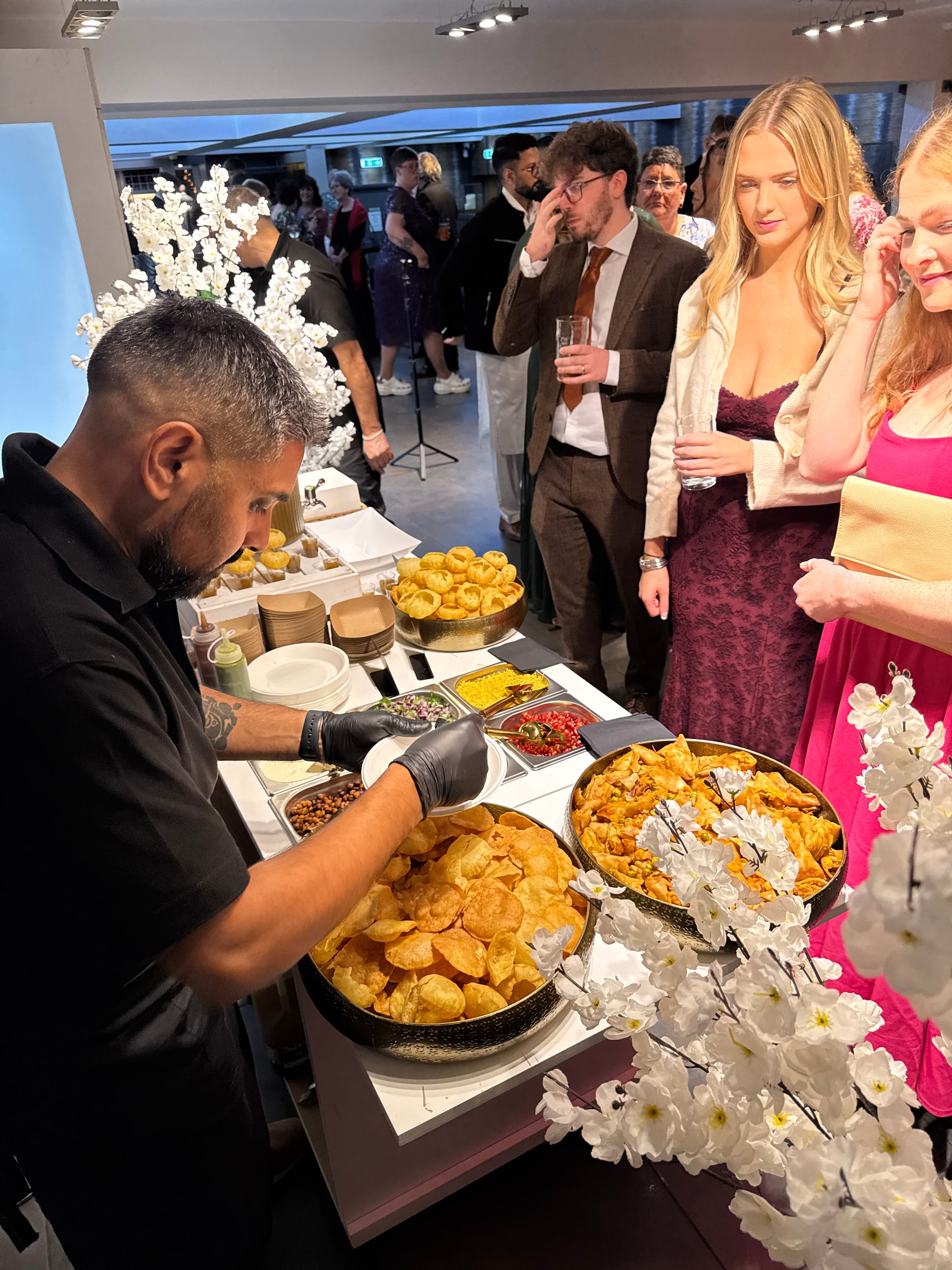 The Sweet St. chaat counter serving guests at an event